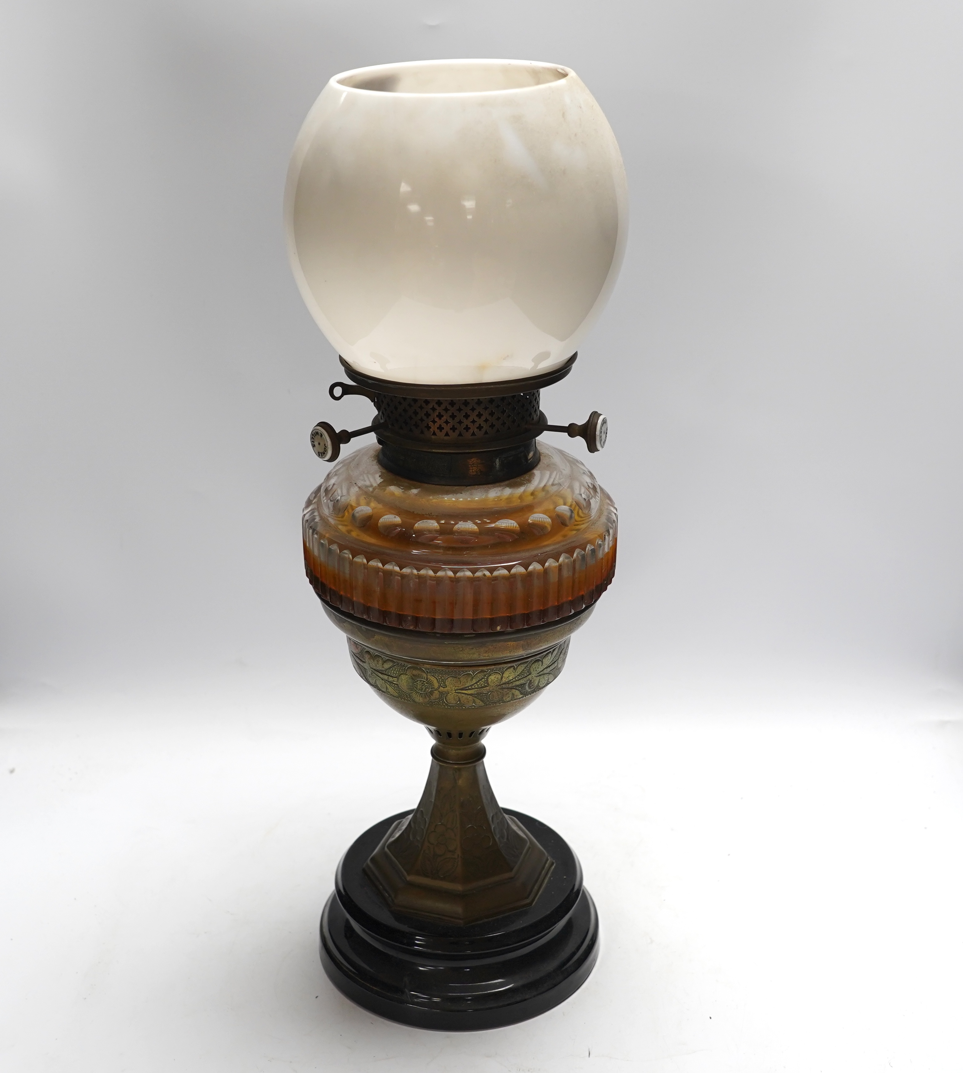 A Victorian glass and brass oil lamp by Jones & Willis, 53cm high